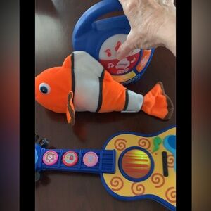 Musical toys and Nemo fish lot
